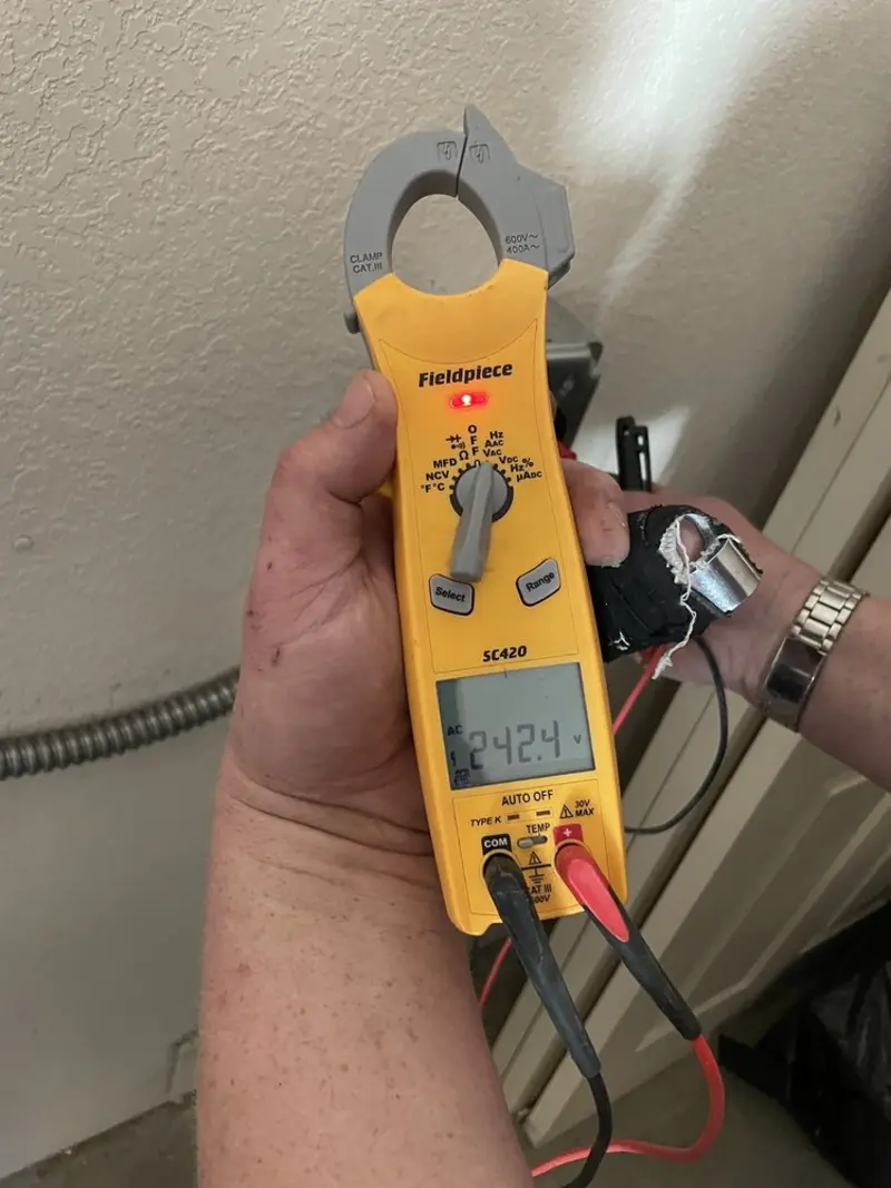 Voltage testing with clamp meter during Outlet Installation in Azusa